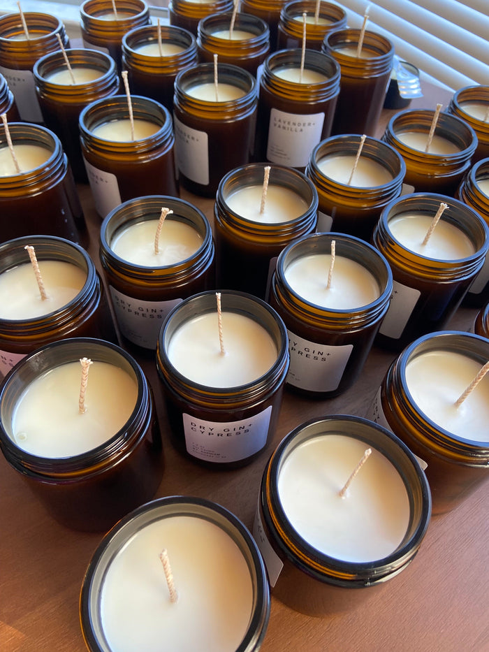 Photo of many open candles on a table