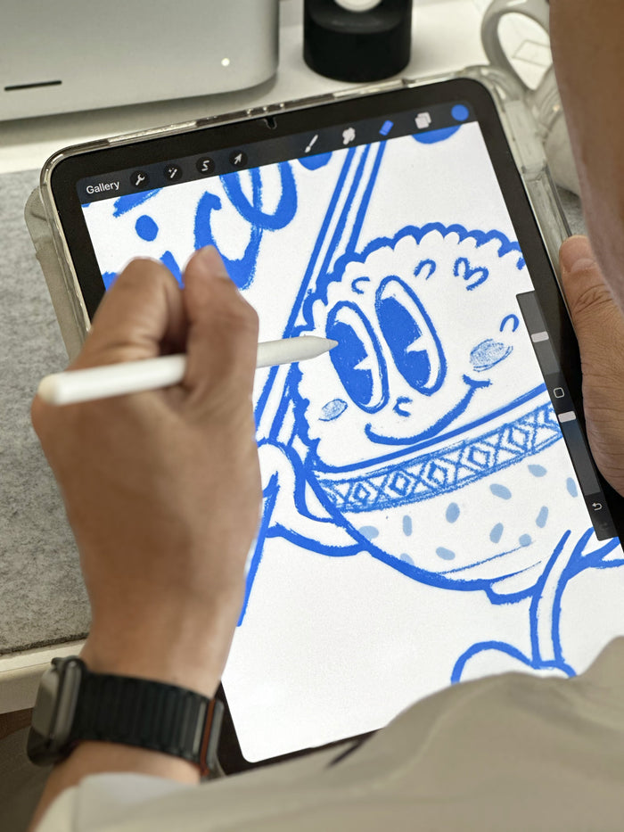 Photo of an ipad with a sketch of a rice bowl on it