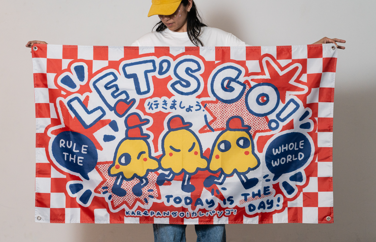 Photo of a cloth banner featuring cute creatures