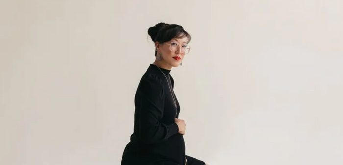 Woman Smiling with a tablet