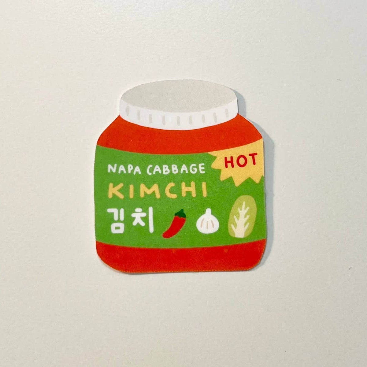 Sticker shaped like a kimchi jar on a light gray background